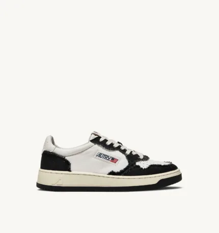 Sneaker Donna Autry Medalist Low Bicolor in Pelle bianca e Tela Nera mod. AULW CB02