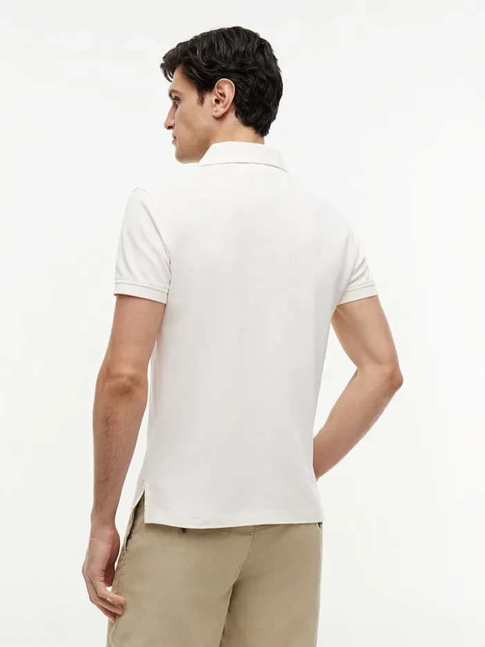Polo Slim fit in piqué di cotone Uomo Tommy Hilfiger Avorio art. MW0MW17771 Z00, foto 2 di 3