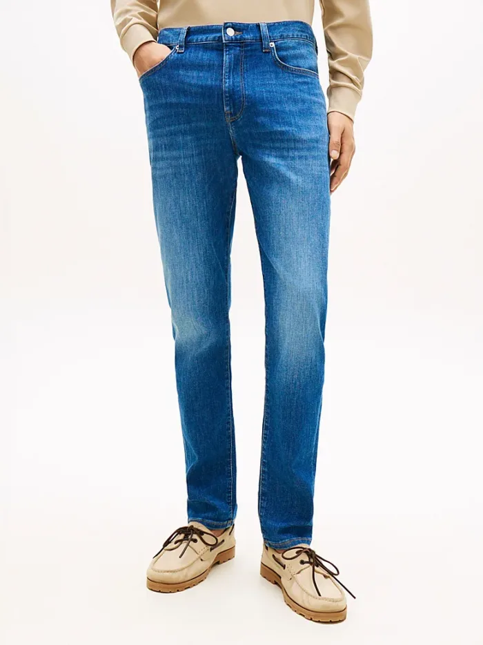 Jeans Bleecker slim Fit Uomo Tommy Hilfiger in Denim Lavaggio Medio con Scoloriture  art. MW0MW42316 1BA, foto 2 di 4