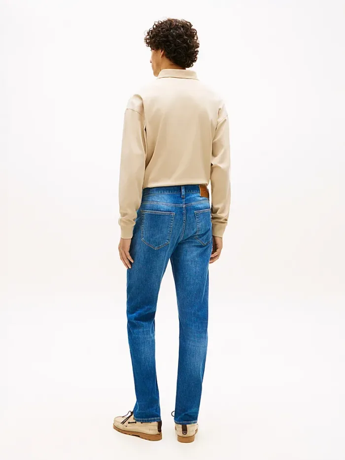 Jeans Bleecker slim Fit Uomo Tommy Hilfiger in Denim Lavaggio Medio con Scoloriture  art. MW0MW42316 1BA, foto 3 di 4